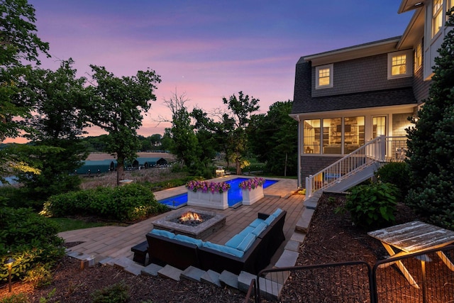 3758 Woodland Cove Pkwy, Minnetrista, MN 55331 - view of patio with an outdoor fire pit, an outdoor pool, and stairway