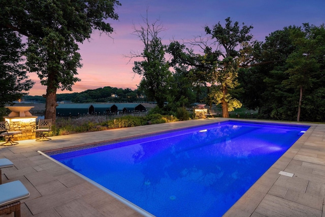 3758 Woodland Cove Pkwy, Minnetrista, MN 55331 - swimming pool featuring a patio area