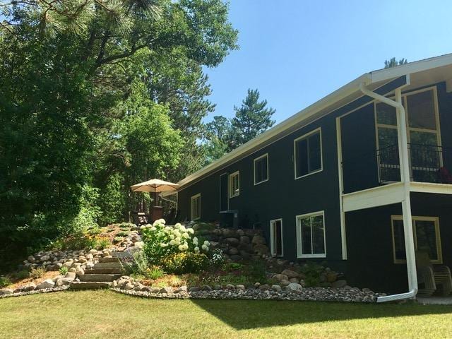 6543 Point Dr, Ideal Twp, MN 56474 - view of property exterior featuring a yard