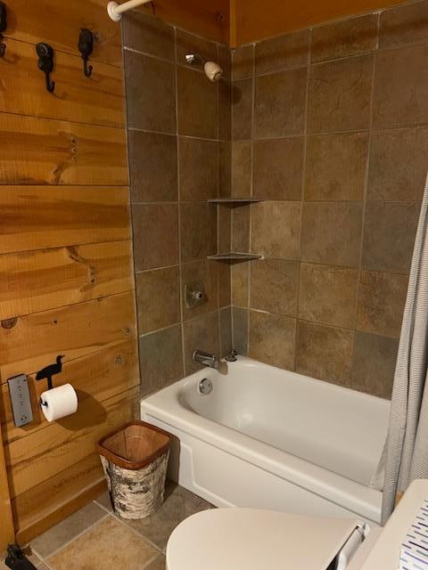6543 Point Dr, Ideal Twp, MN 56474 - full bathroom with shower / bath combo, tile patterned floors, and toilet