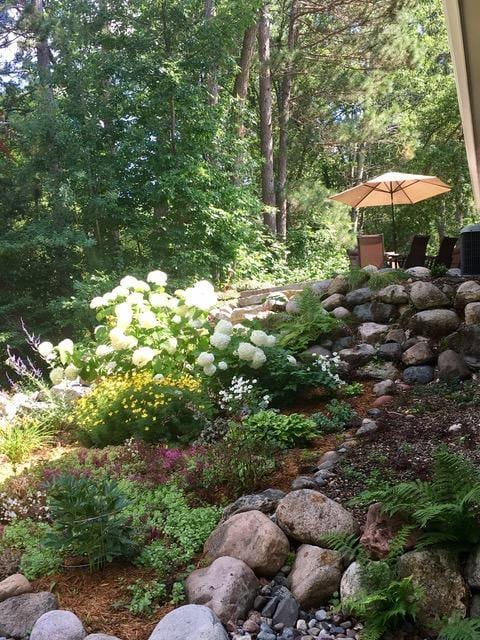 6543 Point Dr, Ideal Twp, MN 56474 - view of yard featuring central AC unit