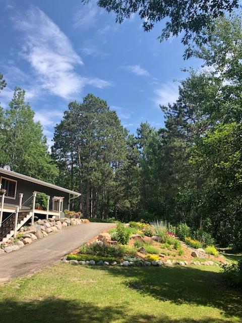 6543 Point Dr, Ideal Twp, MN 56474 - view of grassy yard with stairs