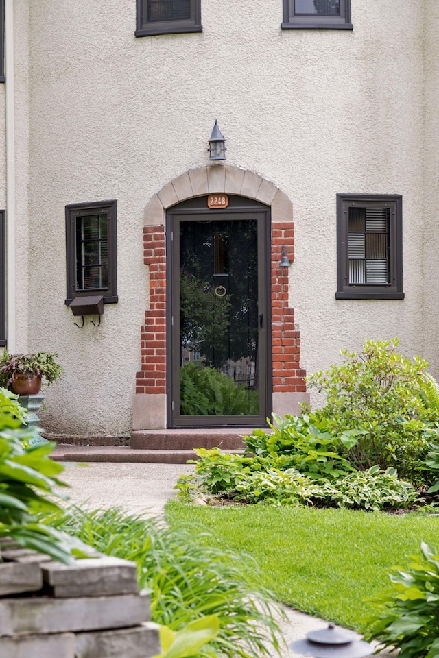 2248 Goodrich Ave, Saint Paul, MN 55105 - doorway to property with stucco siding and brick siding