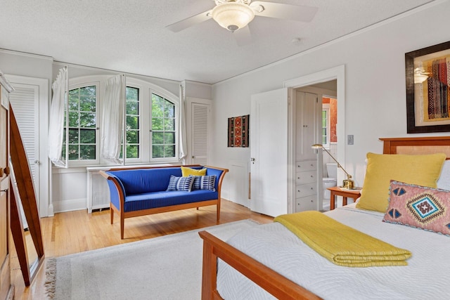 2248 Goodrich Ave, Saint Paul, MN 55105 - bedroom with wood finished floors, ornamental molding, and ceiling fan