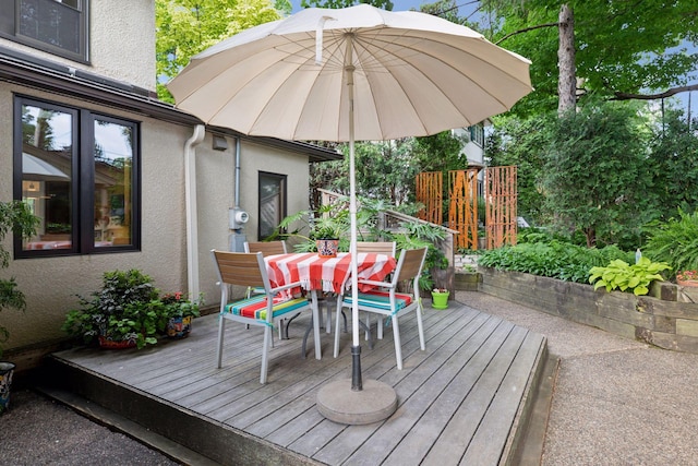 2248 Goodrich Ave, Saint Paul, MN 55105 - wooden deck with outdoor dining space
