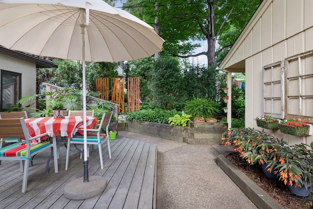 2248 Goodrich Ave, Saint Paul, MN 55105 - wooden deck with outdoor dining space