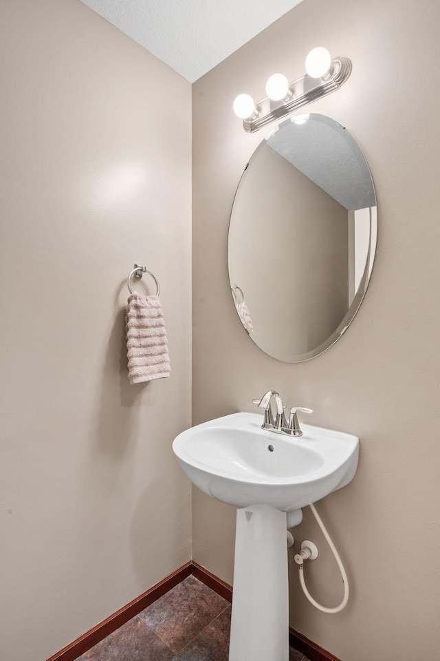 4027 148th Ln NE, Ham Lake, MN 55304 - bathroom featuring baseboards