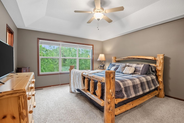 4027 148th Ln NE, Ham Lake, MN 55304 - bedroom with carpet flooring, a raised ceiling, and ceiling fan