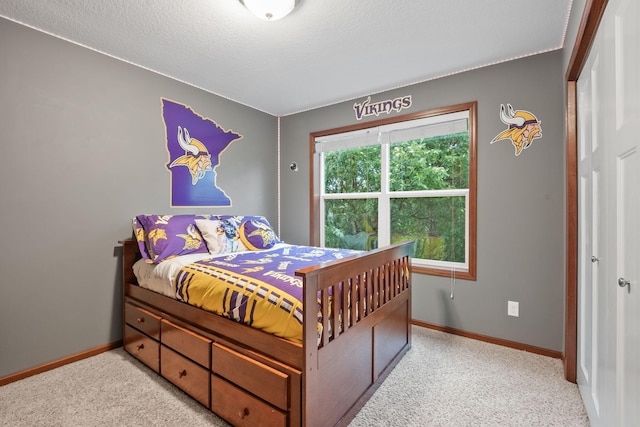 4027 148th Ln NE, Ham Lake, MN 55304 - bedroom featuring light carpet and baseboards