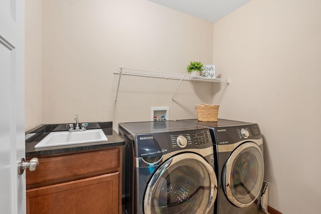 4027 148th Ln NE, Ham Lake, MN 55304 - laundry room with independent washer and dryer, cabinet space, and wet bar