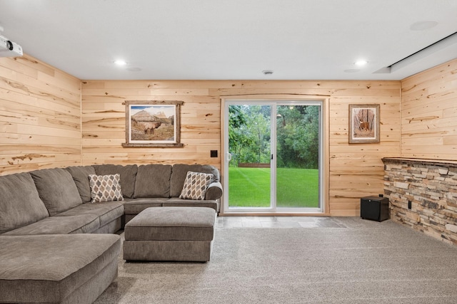 4027 148th Ln NE, Ham Lake, MN 55304 - living room featuring wood walls, recessed lighting, and carpet