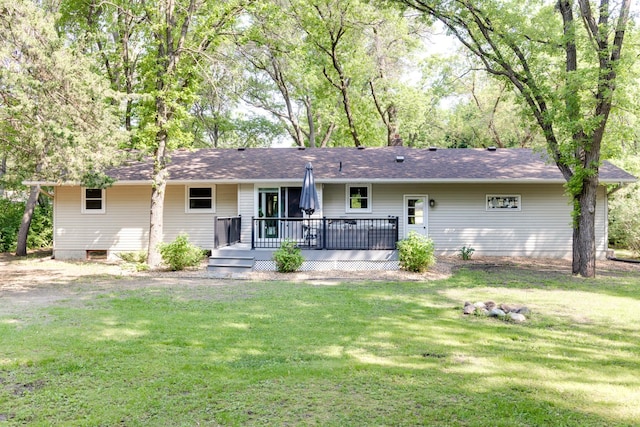 13500 190th Ave NW, Elk River, MN 55330 - back of house featuring a wooden deck, a lawn, and a shingled roof