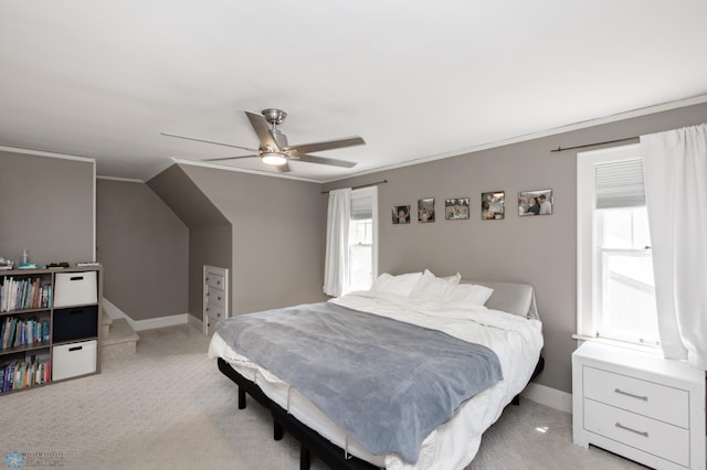 1345 4th St N, Fargo, ND 58102 - bedroom featuring light carpet, baseboards, a ceiling fan, and crown molding