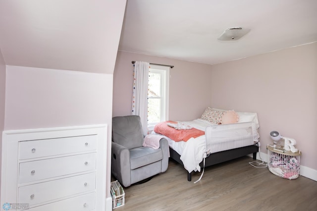 1345 4th St N, Fargo, ND 58102 - bedroom featuring light wood-style floors and baseboards