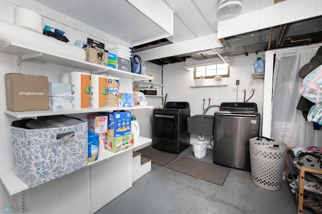 1345 4th St N, Fargo, ND 58102 - basement with separate washer and dryer and a sink
