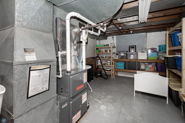 1345 4th St N, Fargo, ND 58102 - unfinished basement with heating unit