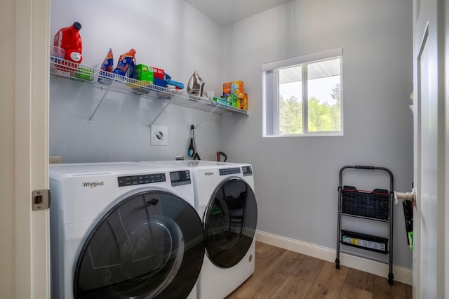 1320 Whiting Rd NW Unit 71, Bemidji, MN 56601 - laundry room with independent washer and dryer, wood finished floors, and baseboards