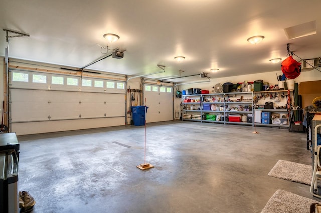 1320 Whiting Rd NW Unit 71, Bemidji, MN 56601 - garage with a garage door opener
