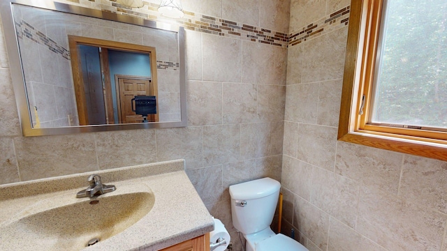 4251 Sugar Pt, Orr, MN 55771 - half bath with toilet, vanity, and tile walls