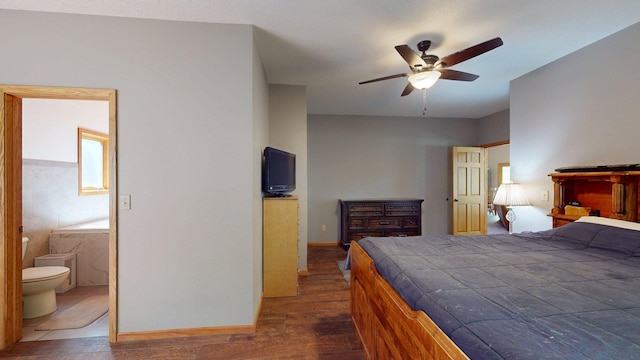 4251 Sugar Pt, Orr, MN 55771 - bedroom featuring dark wood-style flooring, baseboards, ensuite bath, and ceiling fan