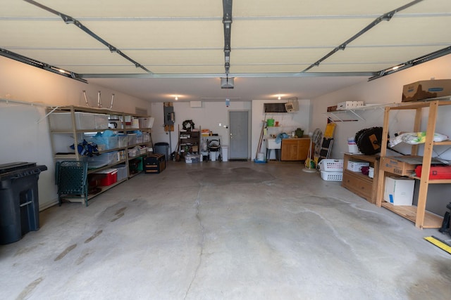 2842 19th Ave NW, Rochester, MN 55901 - garage with a garage door opener and electric panel