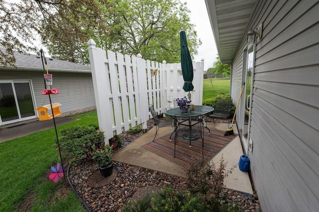 2842 19th Ave NW, Rochester, MN 55901 - wooden terrace with a patio area