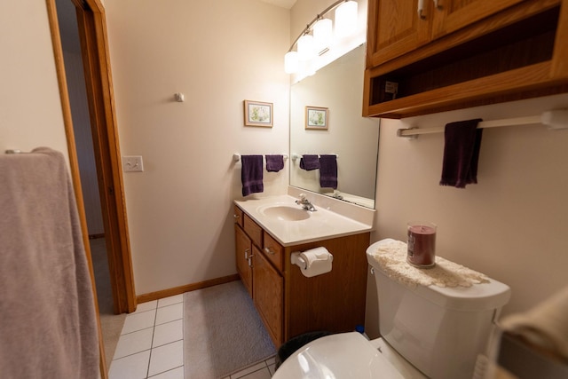 2842 19th Ave NW, Rochester, MN 55901 - bathroom featuring vanity, tile patterned floors, and toilet