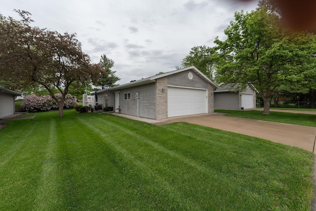 2842 19th Ave NW, Rochester, MN 55901 - view of green lawn with an outdoor structure and a detached garage