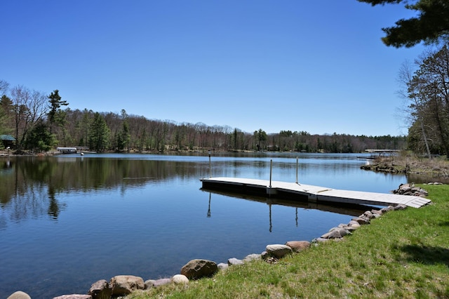 10151 Sandy Beach Rd, Round Lake Twp, WI 54843 - dock featuring a view of trees and a water view