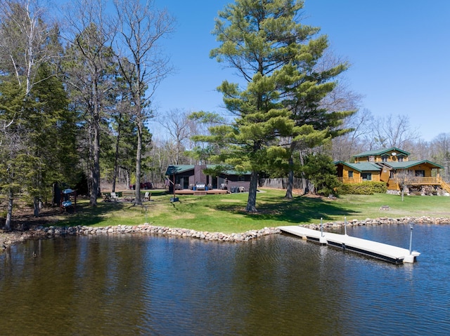 10151 Sandy Beach Rd, Round Lake Twp, WI 54843 - dock area featuring a water view and a lawn
