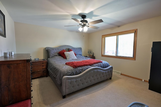 10151 Sandy Beach Rd, Round Lake Twp, WI 54843 - bedroom with carpet, baseboards, and ceiling fan