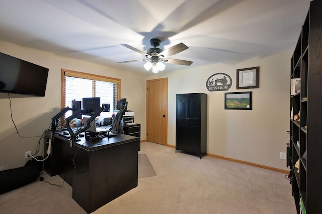 10151 Sandy Beach Rd, Round Lake Twp, WI 54843 - home office featuring ceiling fan, light carpet, and baseboards