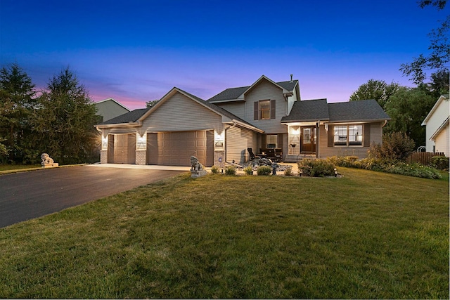 5630 Oak View Ct, Savage, MN 55378 - view of front of property featuring an attached garage, driveway, and a lawn