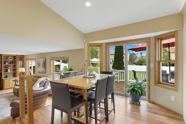 5630 Oak View Ct, Savage, MN 55378 - dining space with light wood-style floors, high vaulted ceiling, and recessed lighting
