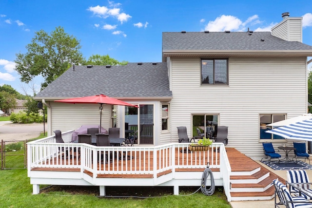 5630 Oak View Ct, Savage, MN 55378 - back of property featuring outdoor dining area, a wooden deck, and roof with shingles