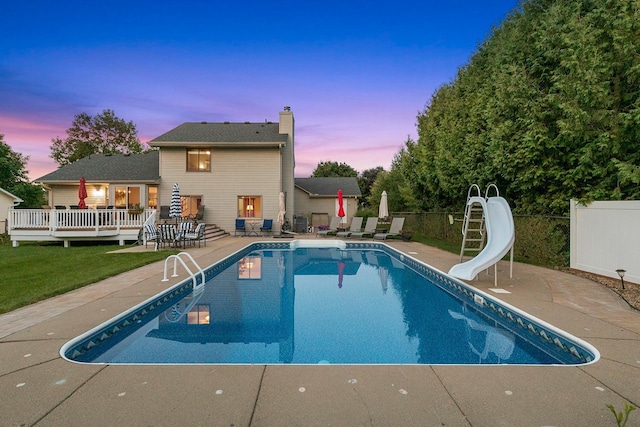 5630 Oak View Ct, Savage, MN 55378 - view of pool with a patio area, a water slide, and a wooden deck