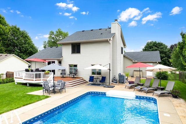 5630 Oak View Ct, Savage, MN 55378 - rear view of property with a wooden deck, a chimney, roof with shingles, a patio, and outdoor dining area