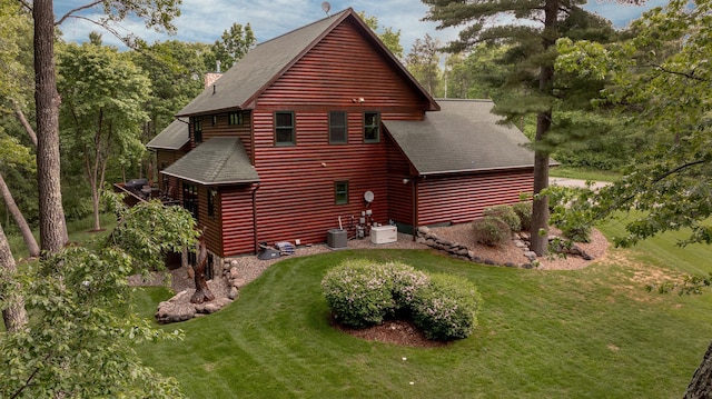31839 Cree Bay Cir, Pelican Twp, MN 56472 - rear view of property with a shingled roof, a yard, and log veneer siding