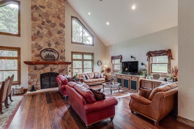 31839 Cree Bay Cir, Pelican Twp, MN 56472 - living area featuring high vaulted ceiling, a stone fireplace, dark wood-type flooring, a textured wall, and recessed lighting