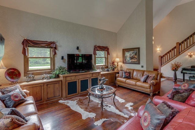 31839 Cree Bay Cir, Pelican Twp, MN 56472 - living room featuring wood finished floors, high vaulted ceiling, and stairway