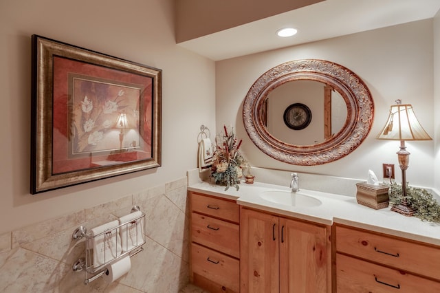 31839 Cree Bay Cir, Pelican Twp, MN 56472 - bathroom with vanity, tile walls, wainscoting, and recessed lighting