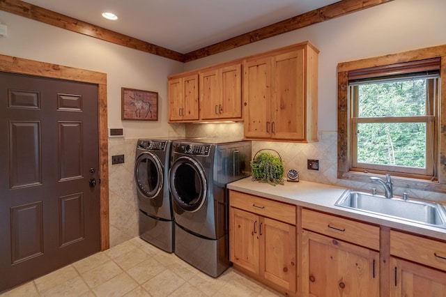 31839 Cree Bay Cir, Pelican Twp, MN 56472 - washroom featuring cabinet space, washer and clothes dryer, and wainscoting