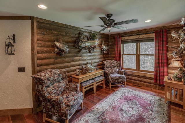 31839 Cree Bay Cir, Pelican Twp, MN 56472 - sitting room with rustic walls, ceiling fan, wood finished floors, baseboards, and a textured wall