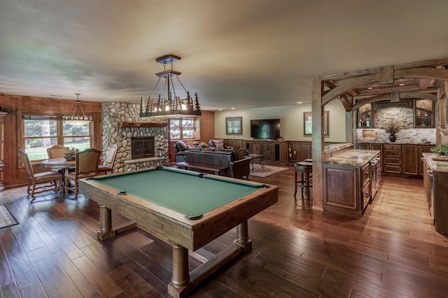 31839 Cree Bay Cir, Pelican Twp, MN 56472 - playroom featuring a stone fireplace, dark wood-type flooring, and billiards