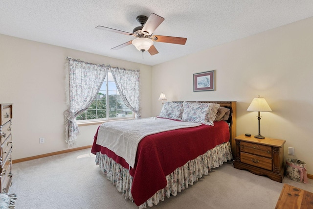 14617 Evergreen Trl Unit 75, Apple Valley, MN 55124 - carpeted bedroom featuring baseboards, a textured ceiling, and a ceiling fan