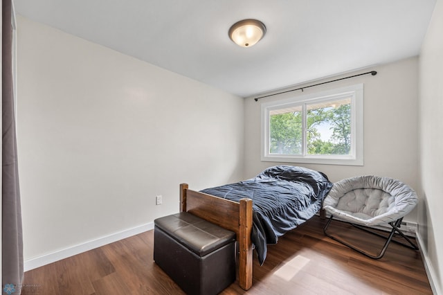1138 20th St N, Moorhead, MN 56560 - bedroom with baseboards and wood finished floors