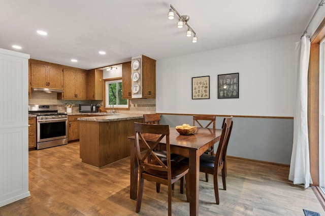 3228 Spruce Trl SW, Prior Lake, MN 55372 - dining area featuring light wood-style floors and recessed lighting