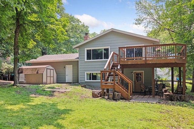 3228 Spruce Trl SW, Prior Lake, MN 55372 - rear view of property featuring a shed, a deck, stairs, and a yard
