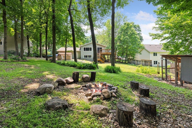 3228 Spruce Trl SW, Prior Lake, MN 55372 - view of yard with an outdoor fire pit, stairs, and a wooden deck