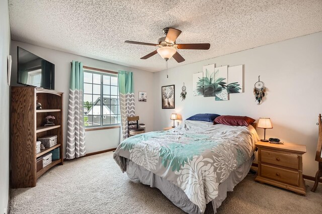 7754 Lachman Ave NE, Otsego, MN 55301 - bedroom with carpet floors, a textured ceiling, ceiling fan, and baseboards